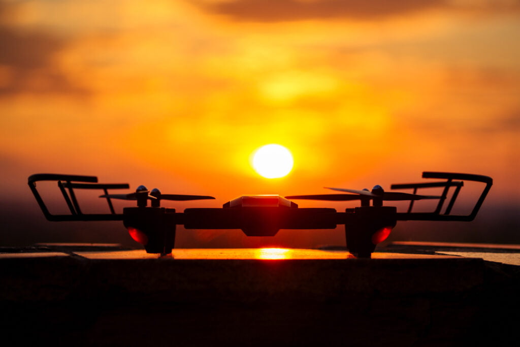 drone drone on a sunset background stands on a table